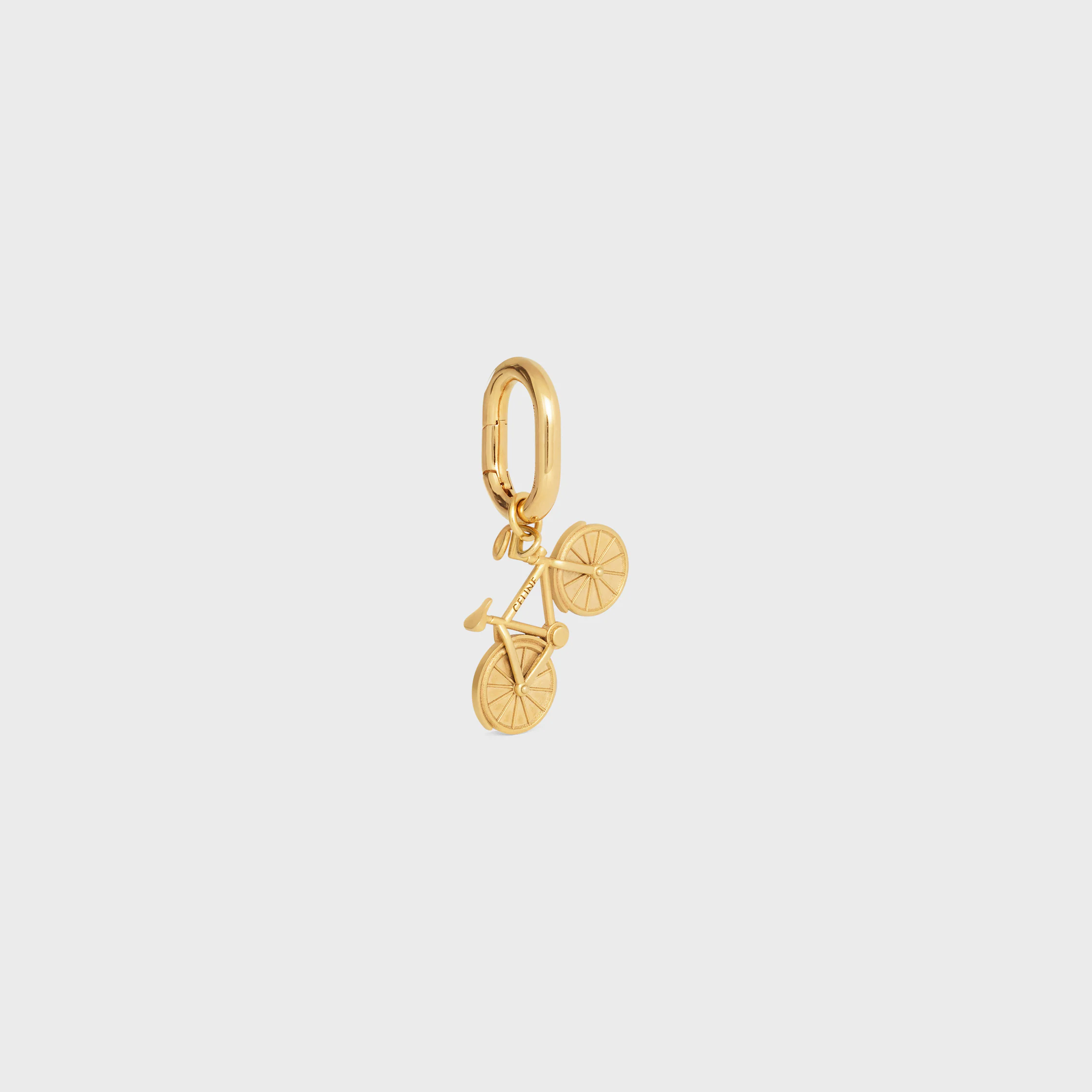 CHARMS CYKEL I BRONS MED GULDSLAG
