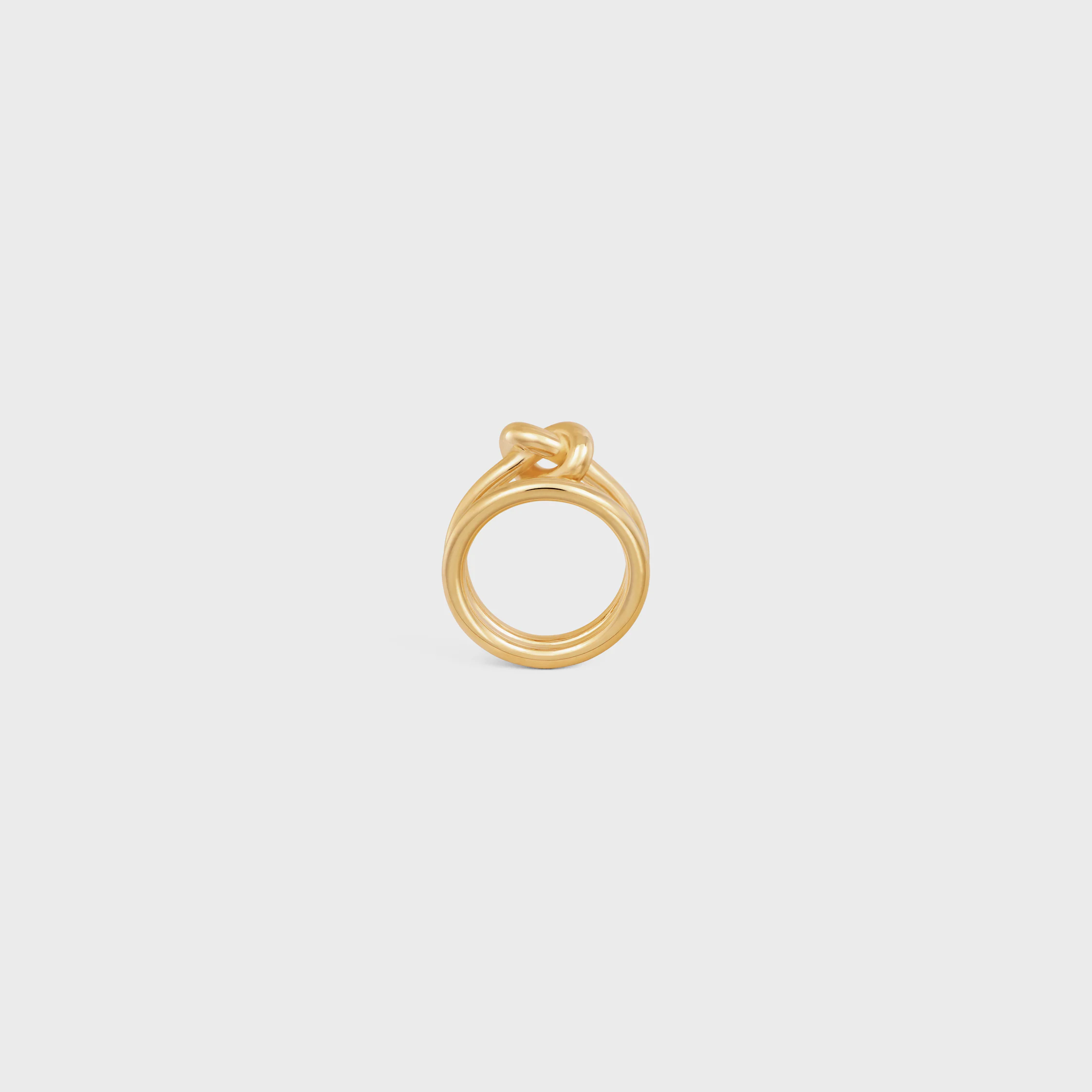 Knot Dubbelring i blankt guld med gyllene finish