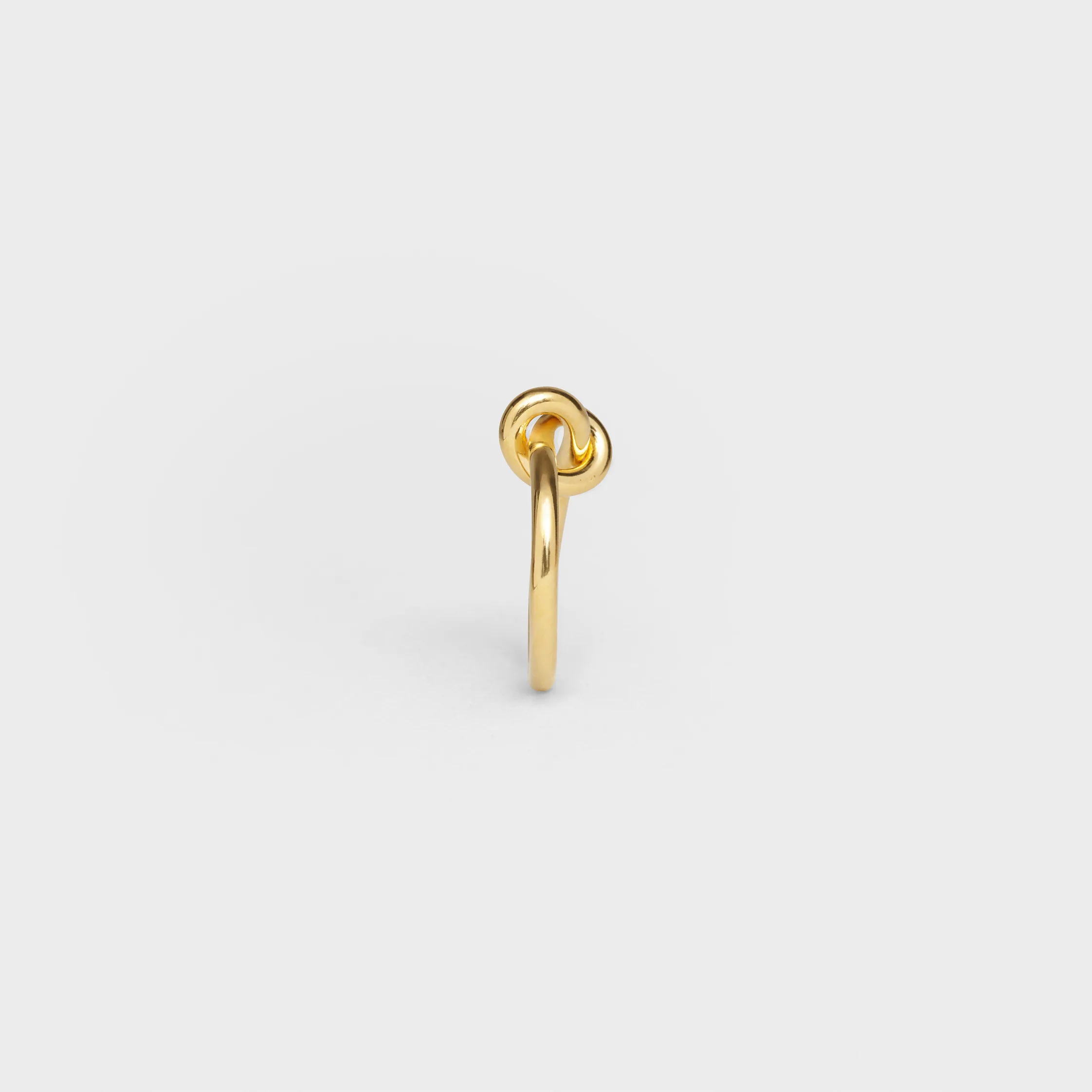 Knutring i blankt koppar med gyllene beläggning