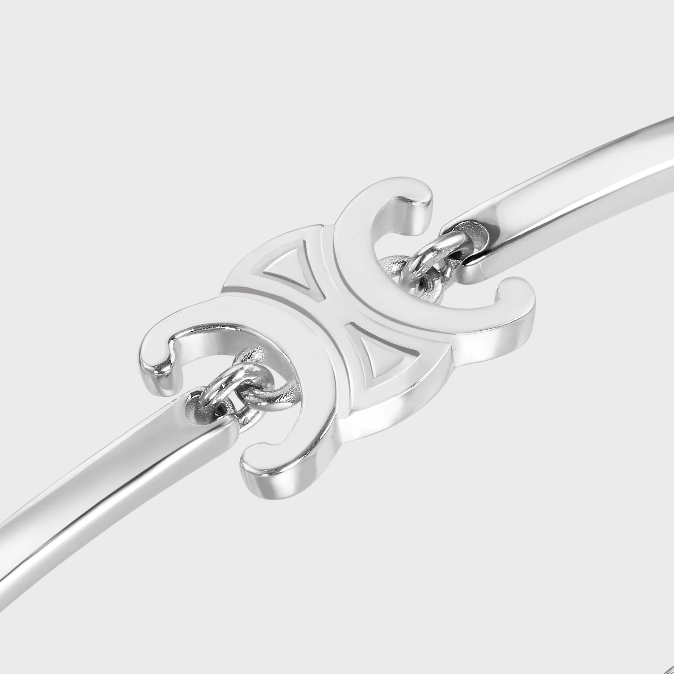 Triomphe-böjbar armband i blankt guld med rhodinbeläggning