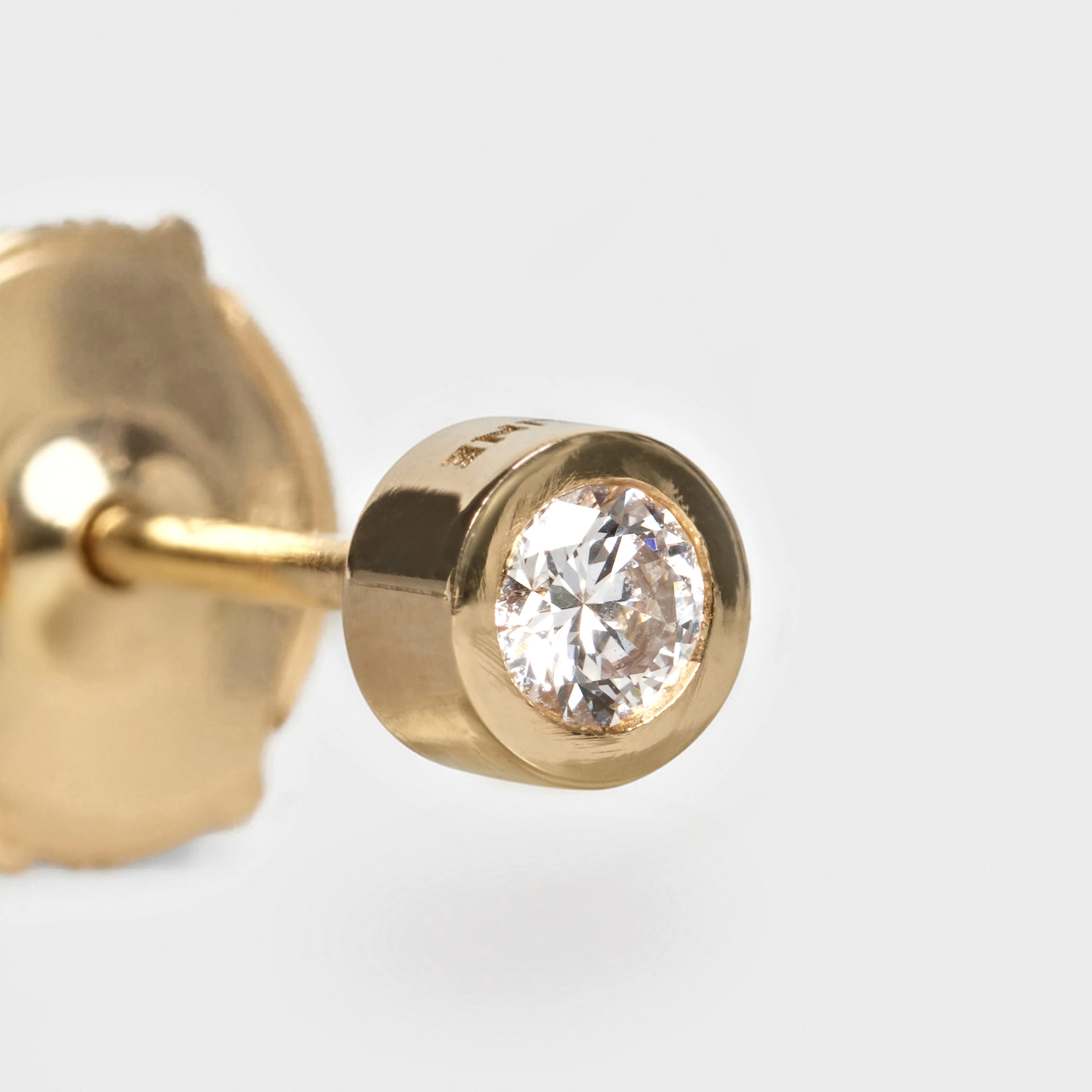 Celine sentimentell studs i guld och diamant