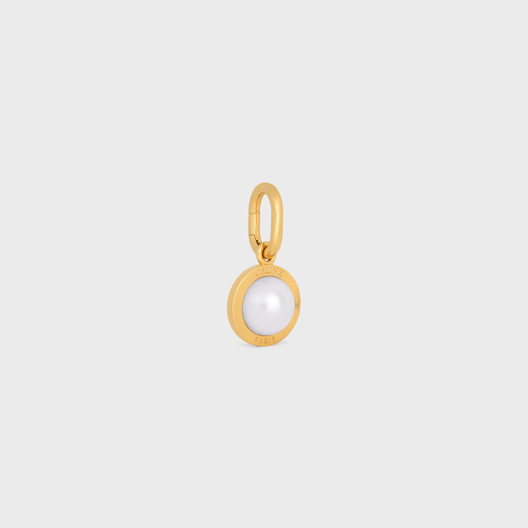 CHARMS PEARL I RESIN PEARL OCH BRONS MED GULDYTA