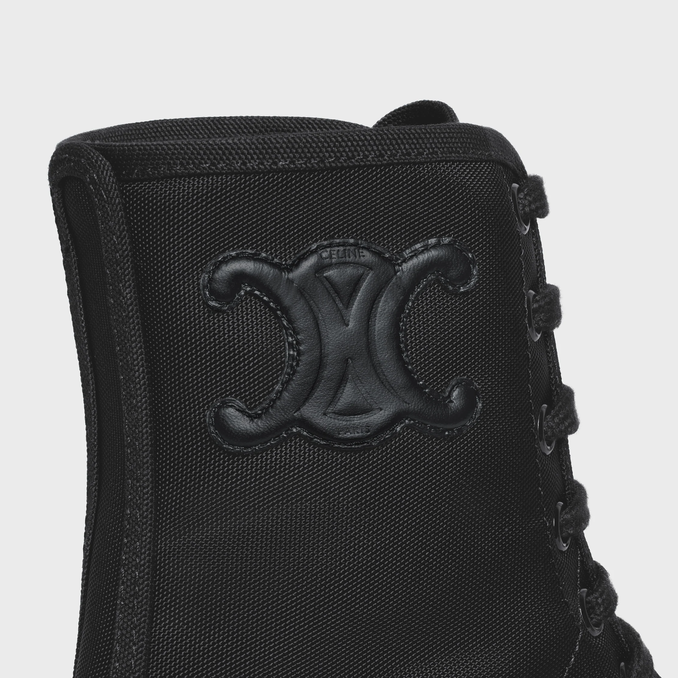 CELINE BULKY LACED UP STÖVLA I NYLON OCH GLÄNSANDE BULL