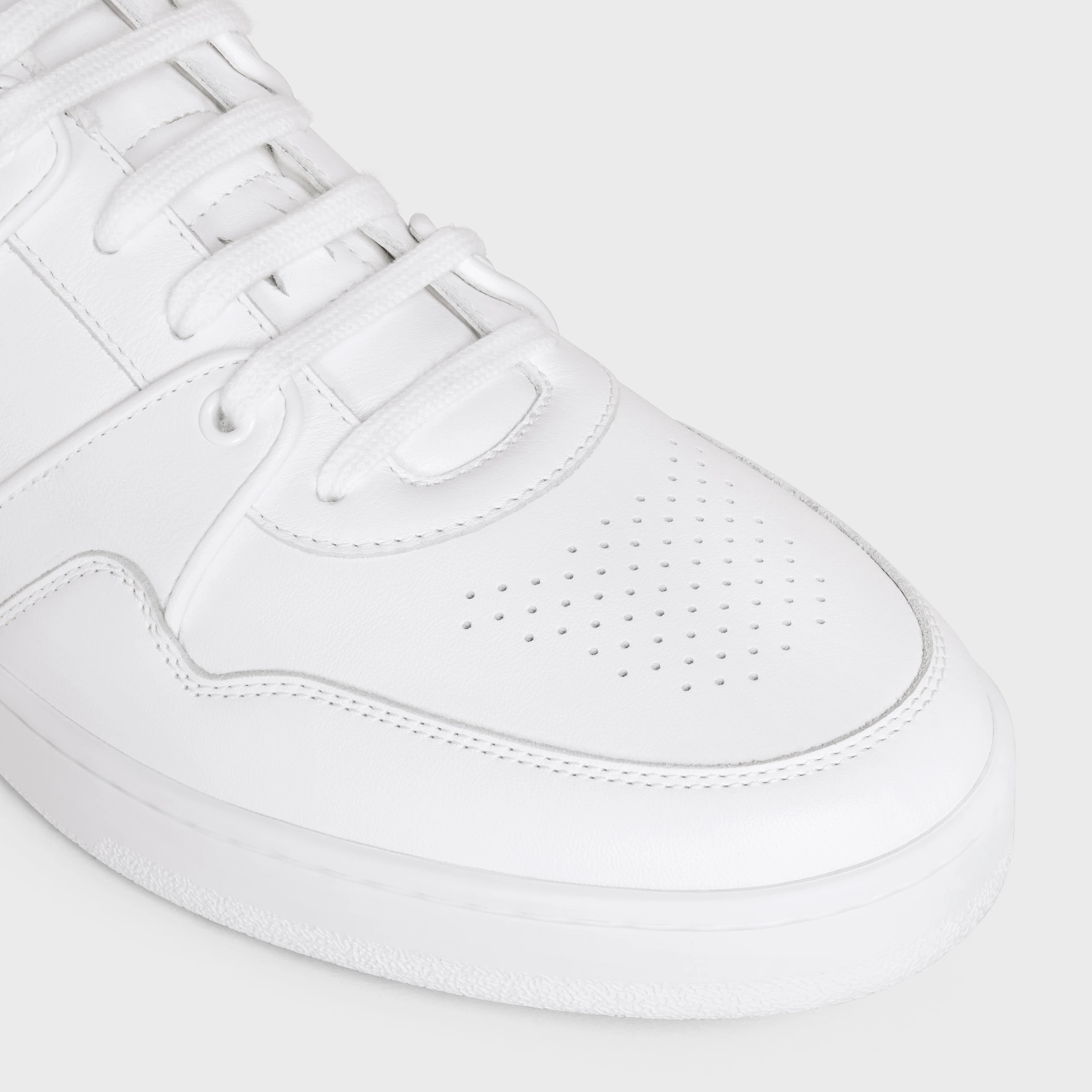 CELINE TRAINER CT-04 LÅG LÄDDE SNEAKER I KALVSKIN