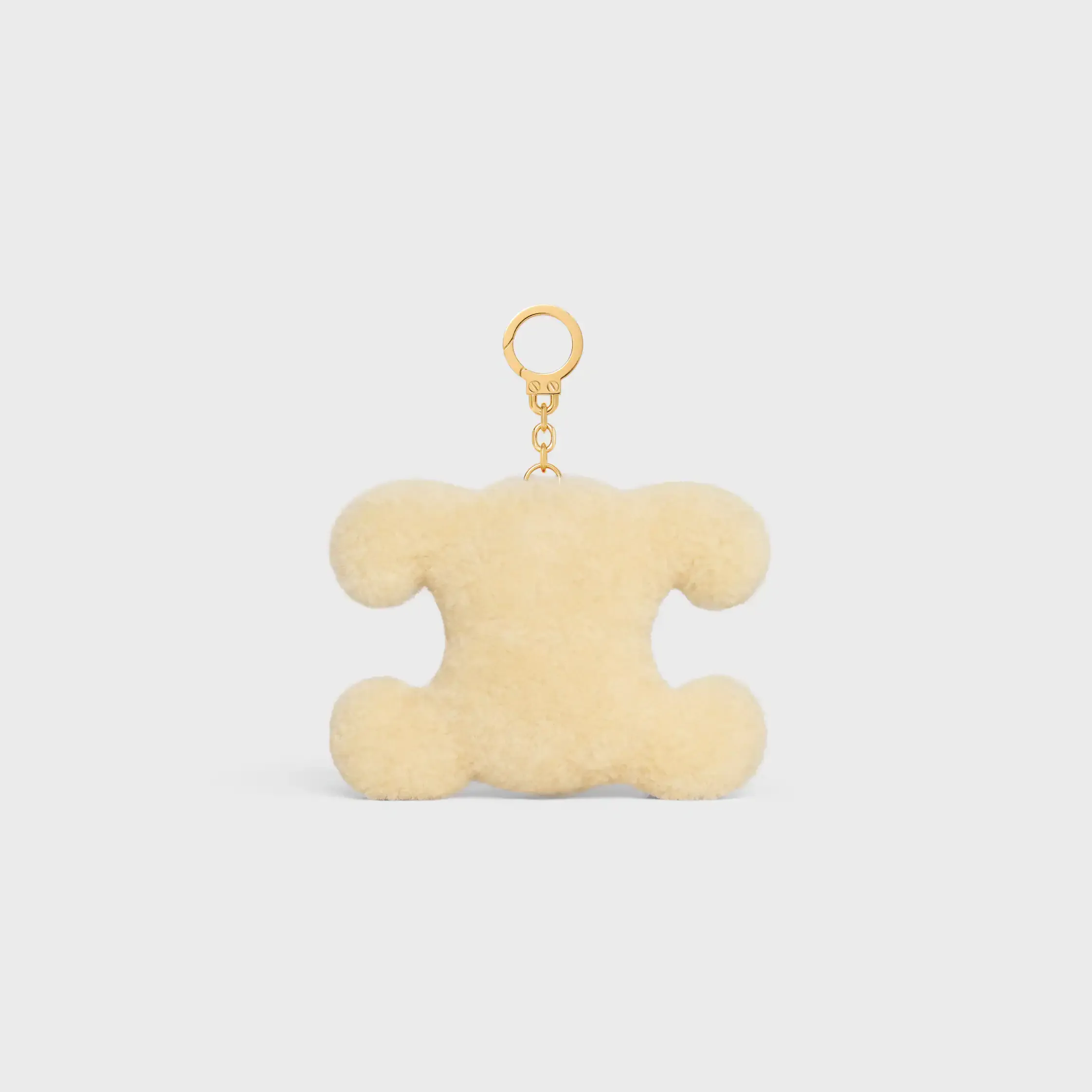 TRIOMPHE POM-POM CHARM ÄPPLE I SKÄRDLINN OCH KALVSKIN