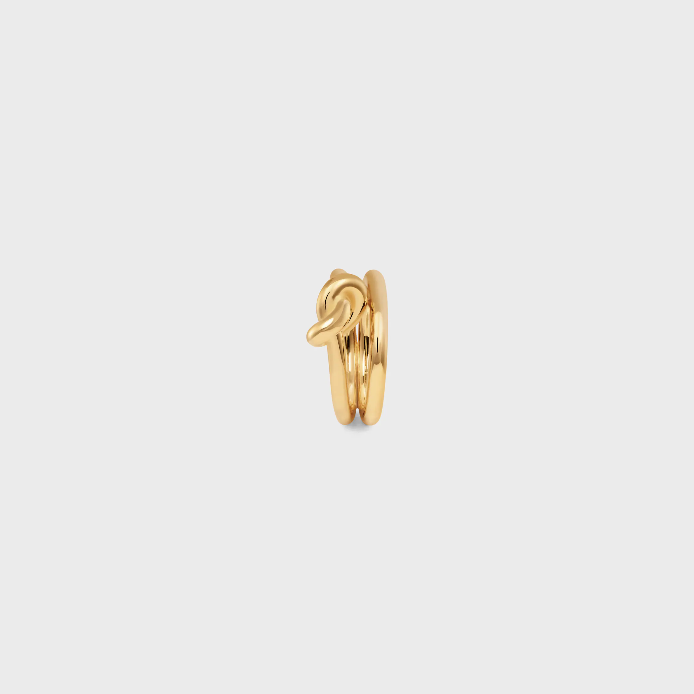 Knot Dubbelring i blankt guld med gyllene finish