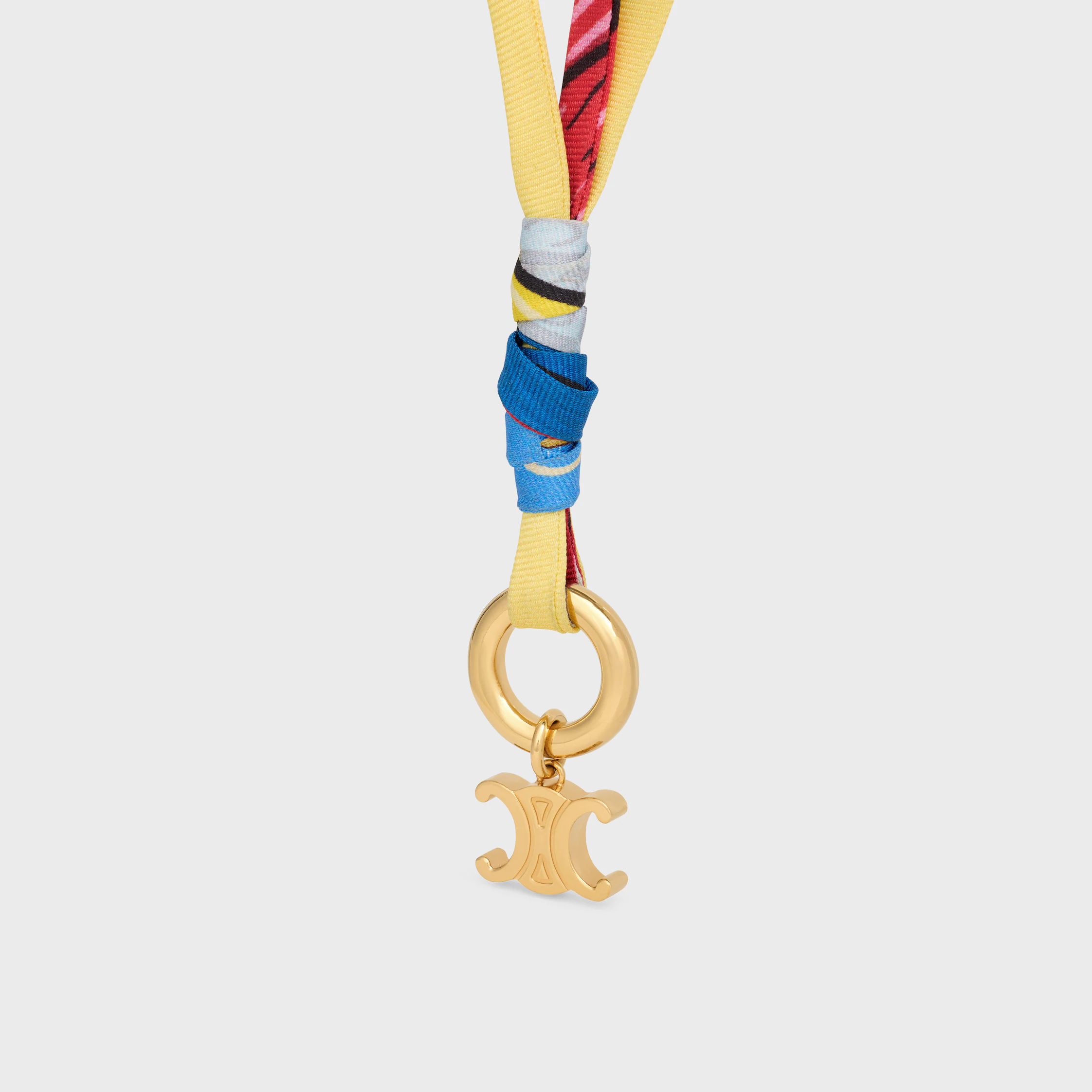 Celine-tyg och messing halsband med guldslag
