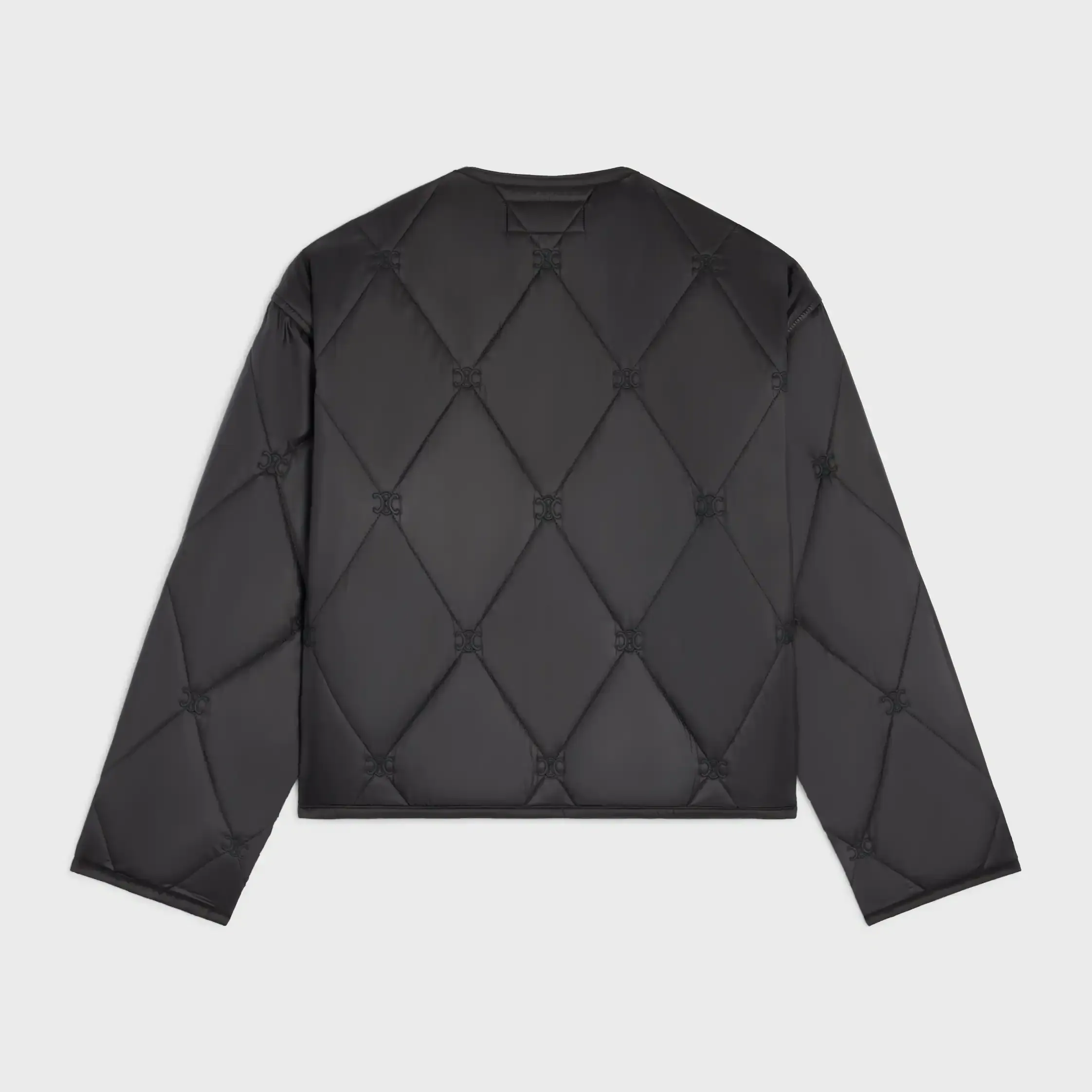 kuddad jacka IN i ljus nylon