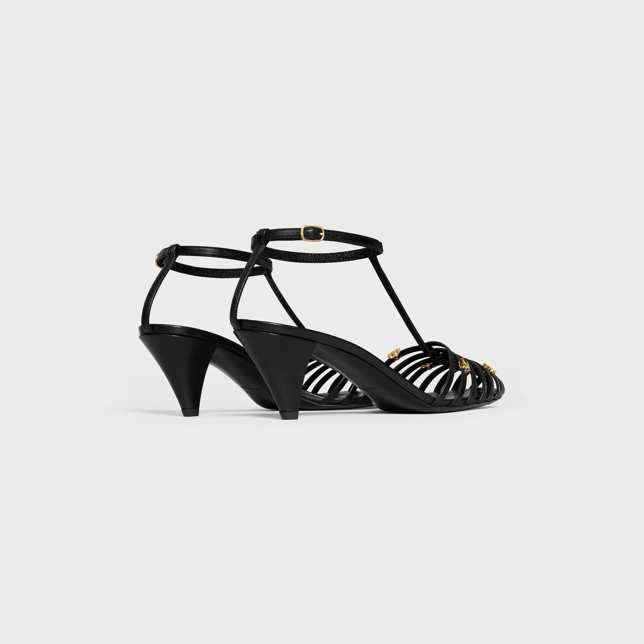 CAGE-HÖJDA SANDAL I GEJKLÄDER