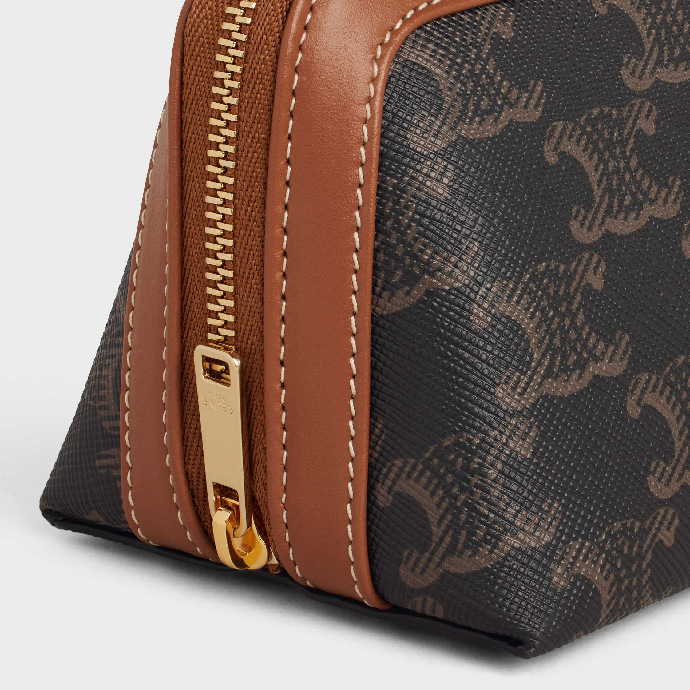 SMALL COSMETIC POUCH I TRIOMPHE TYGEL OCH KALVSKIN