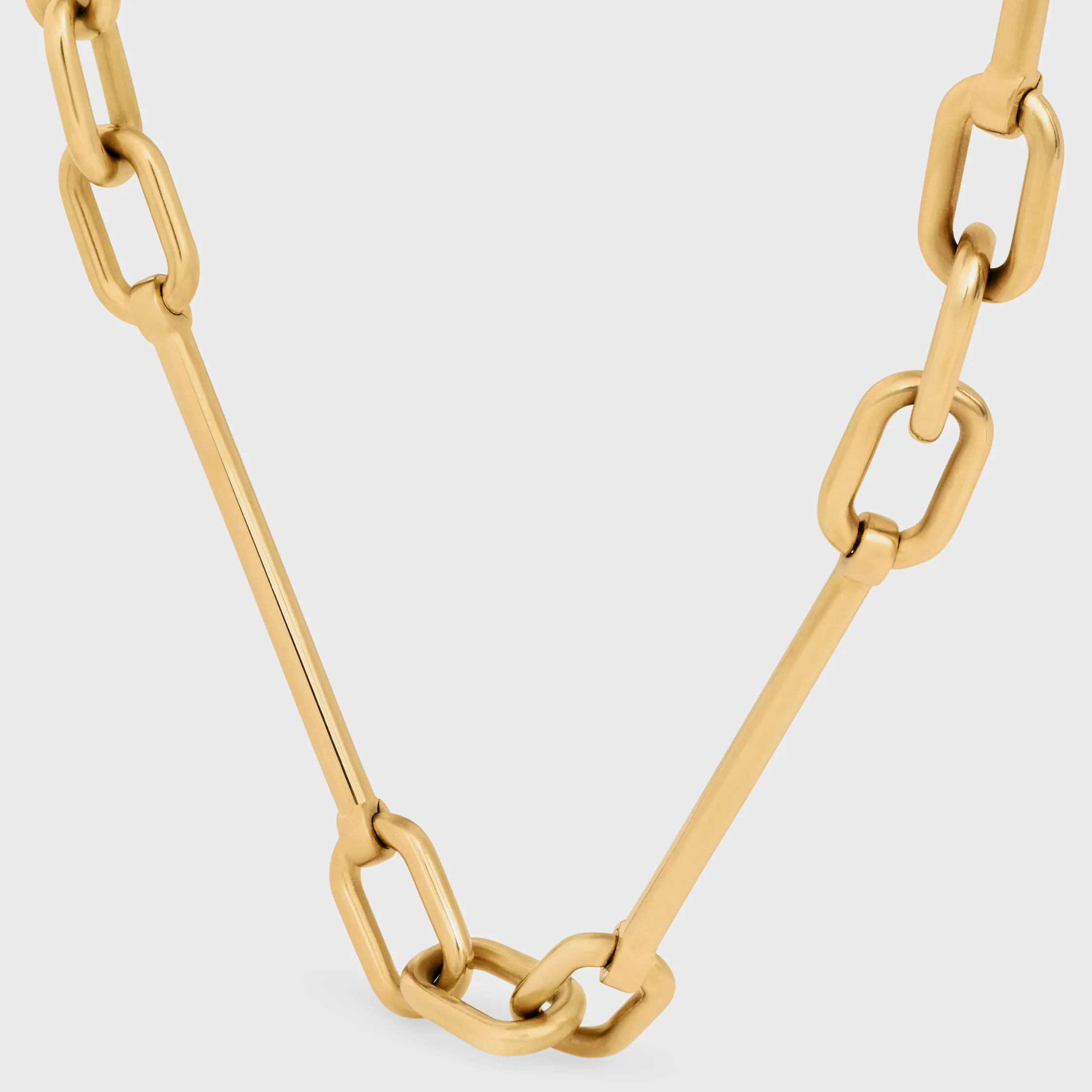 DRAGSNECKLACE I BRONS MED GULDFINISH