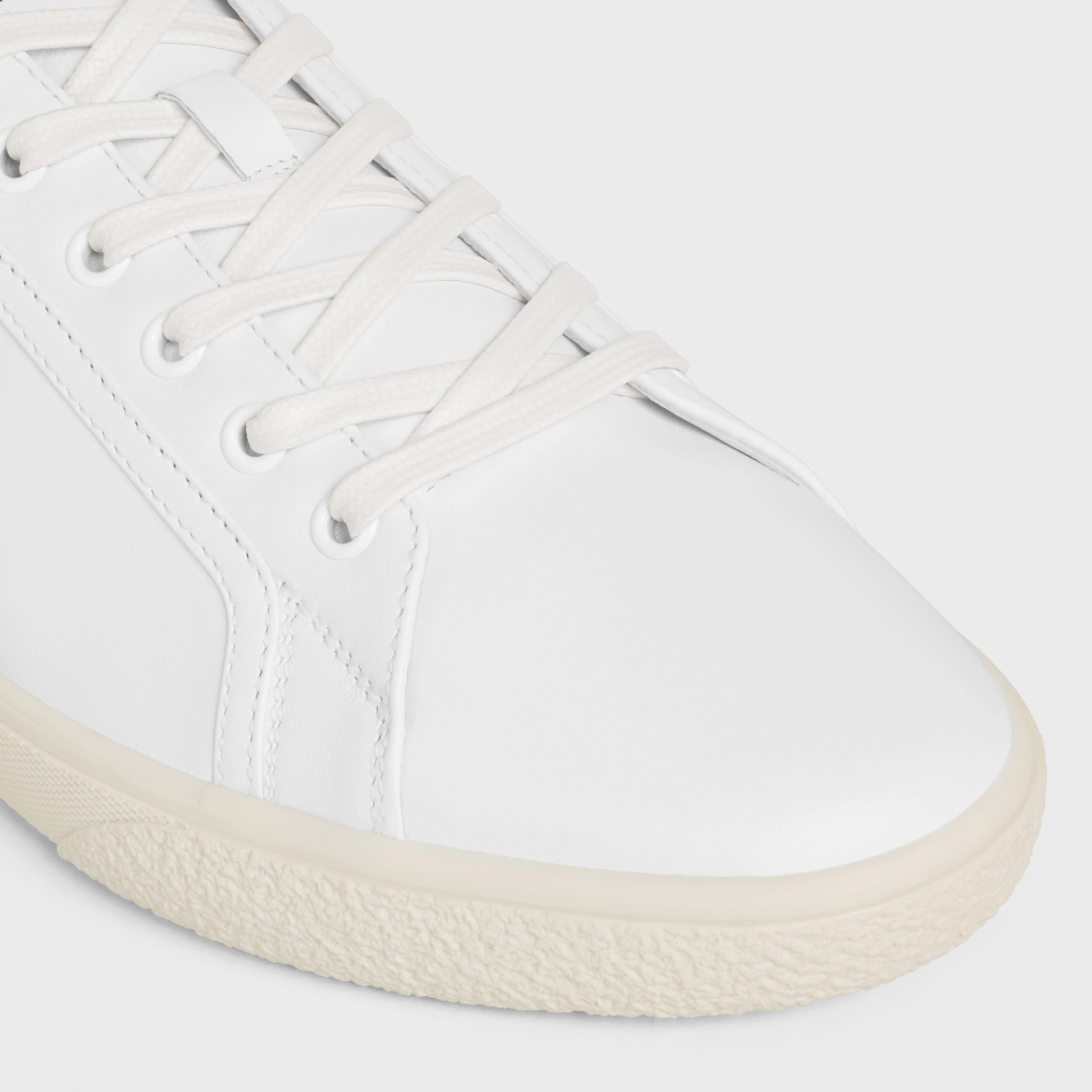 CELINE LOU LÅG LÄDDE SNEAKER MED TRIOMPHE I LAMSKIN