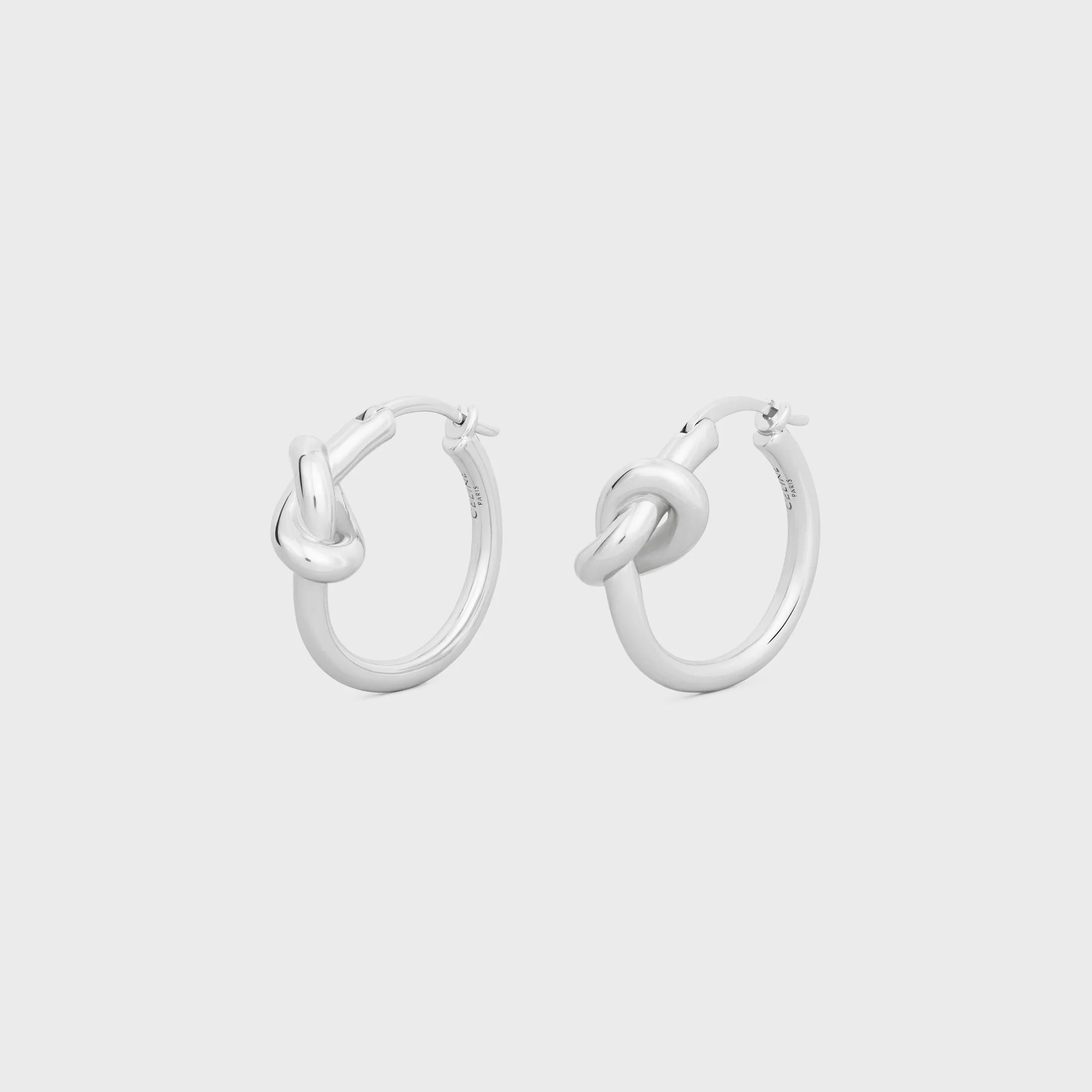 Knot Small Hoops i blankt guld med rhodierad släpp
