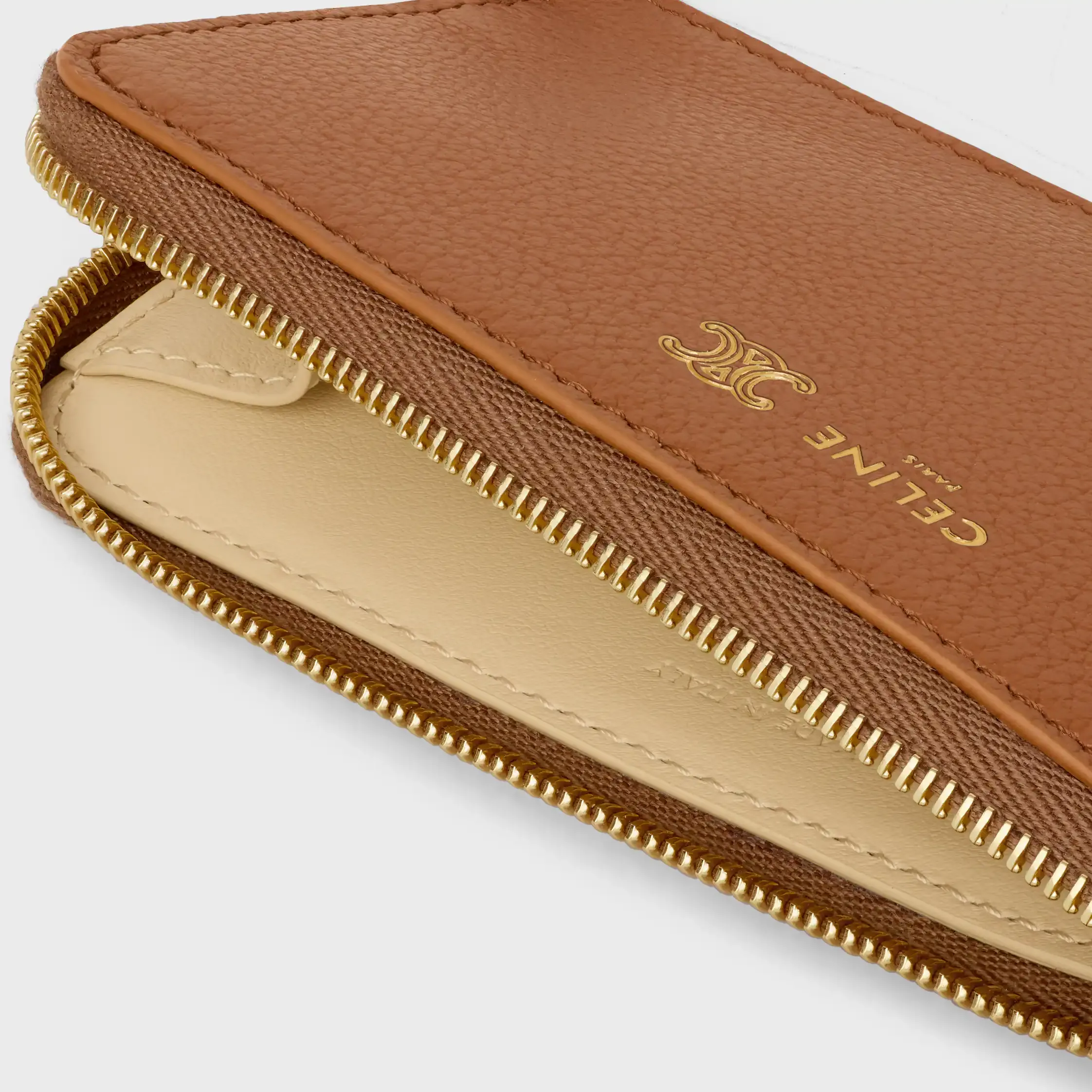 LÅNG ZIPPAD KORTHÅLLARE I MÖRK GRANNAD KALVSKIN