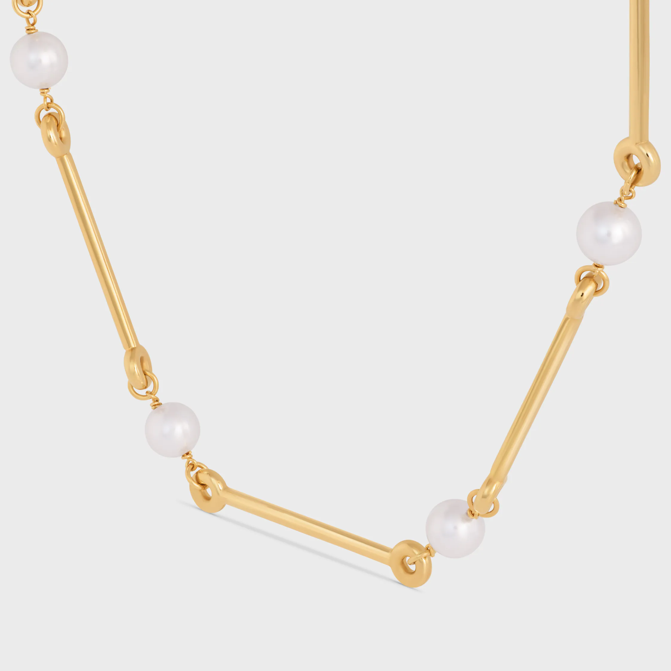 Les Perles Celine rakt halsband i resinperlor och messing med gyllene beläggning