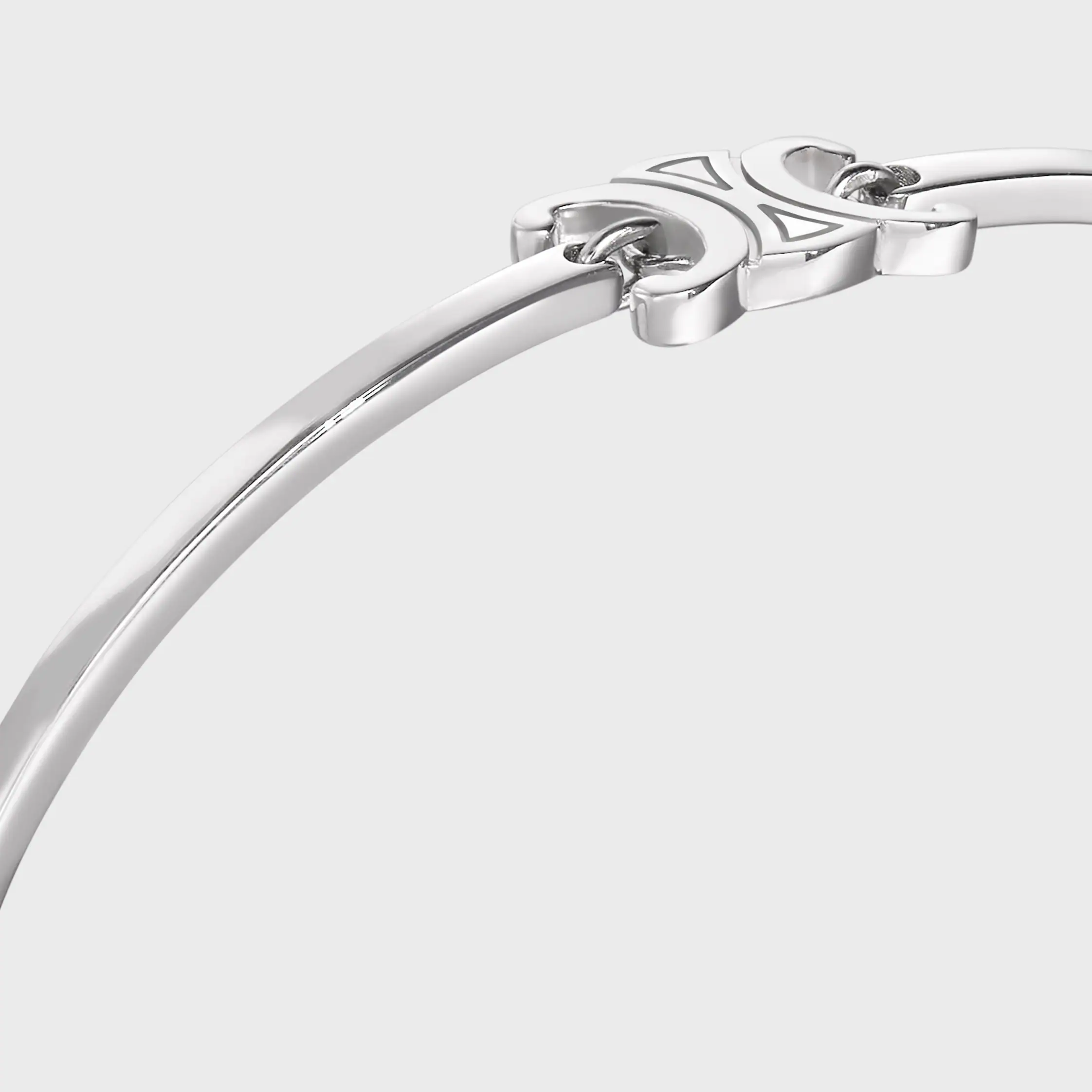 Triomphe-böjbar armband i blankt guld med rhodinbeläggning