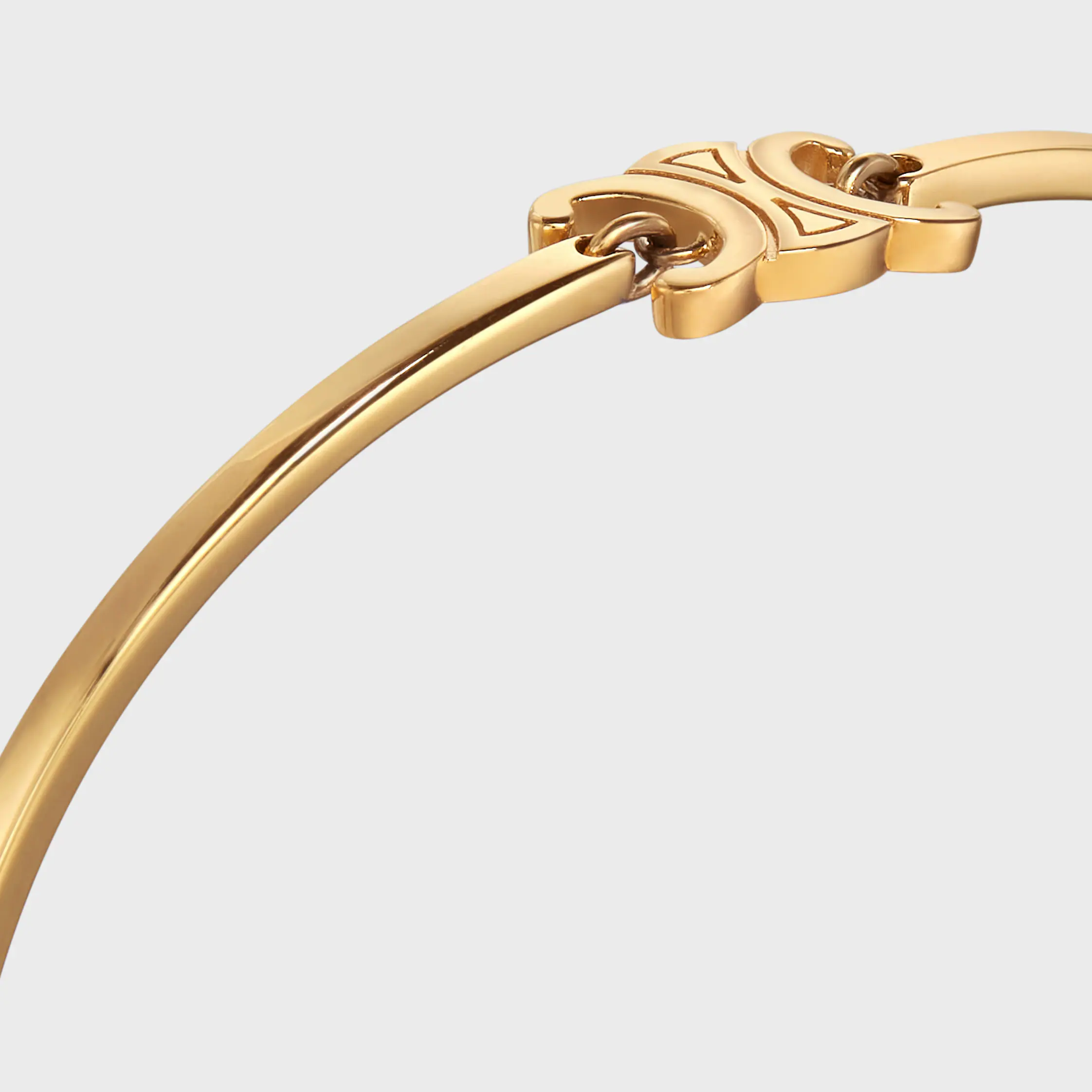 Triomphe-böjbar armband i blankt guld med guldslag
