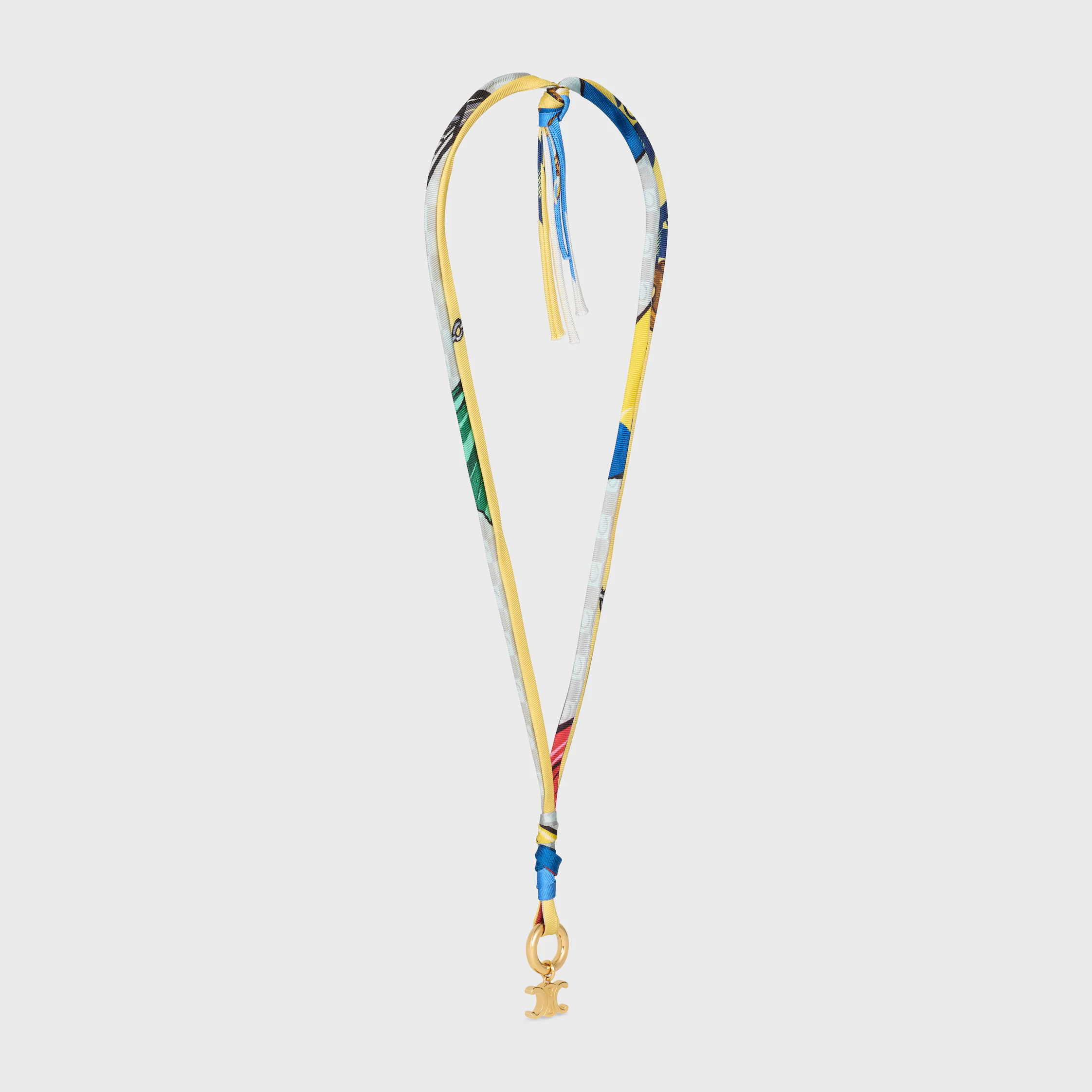 Celine-tyg och messing halsband med guldslag