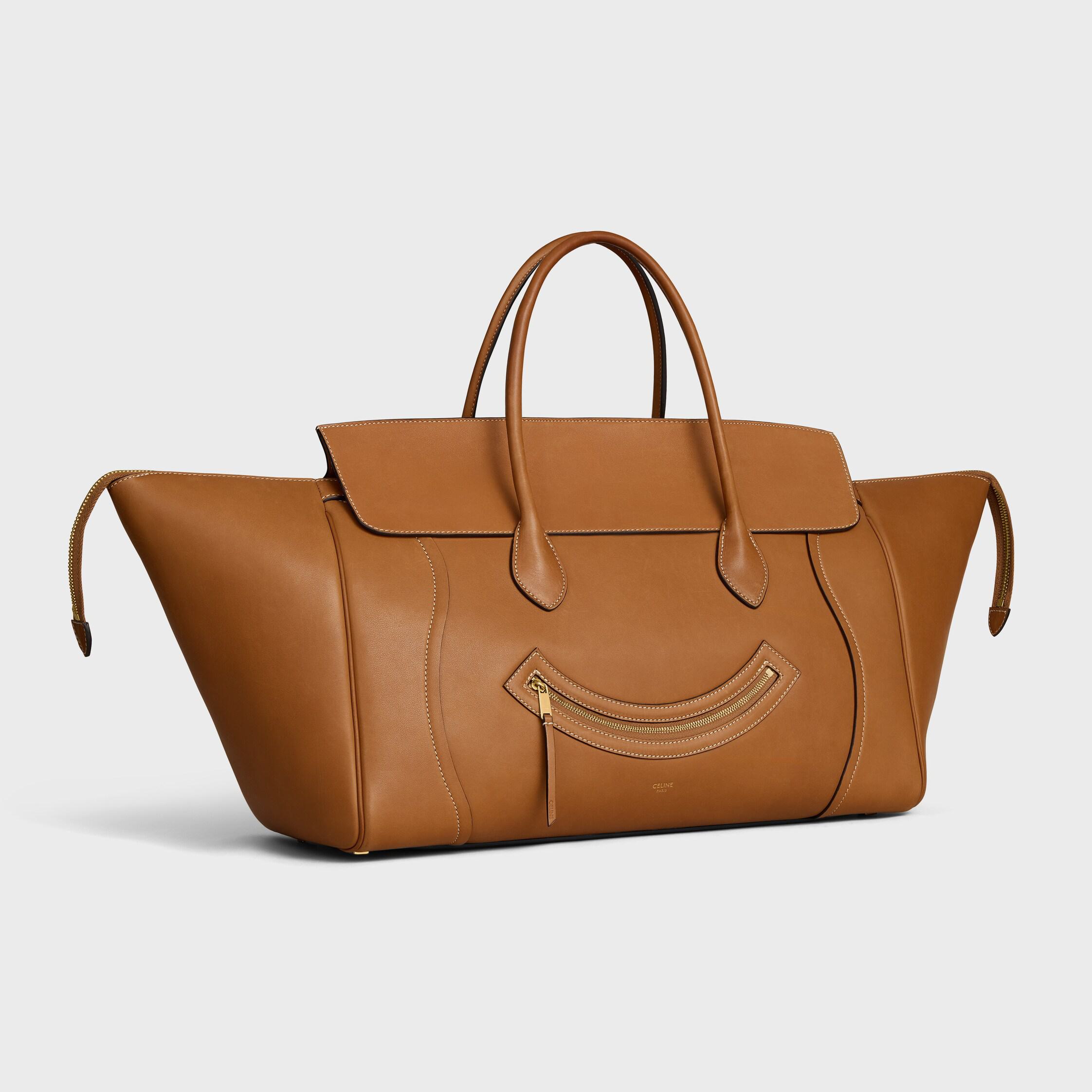 BIG SMILE BAGAGE I Naturlig mjuk kalvskinn