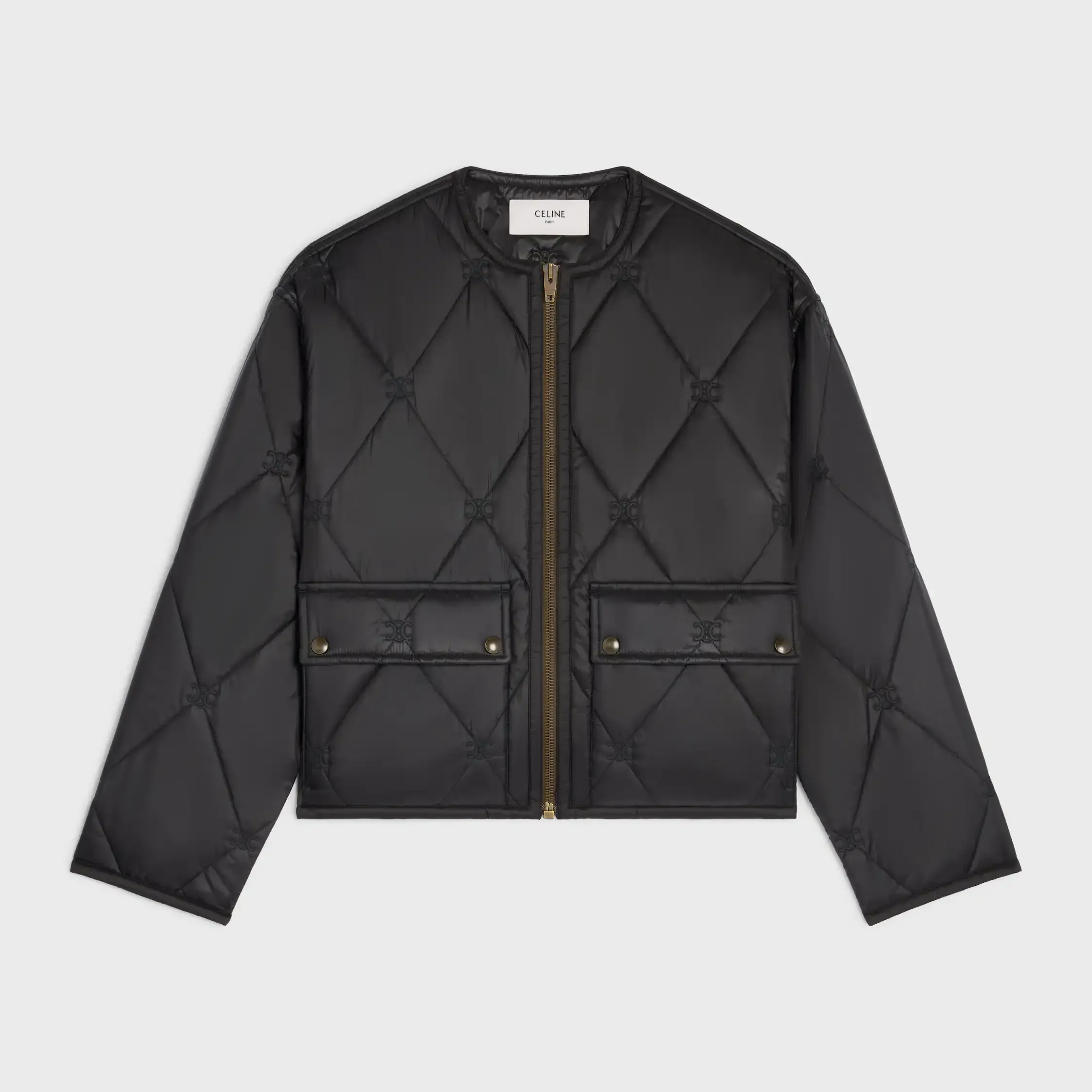 kuddad jacka IN i ljus nylon
