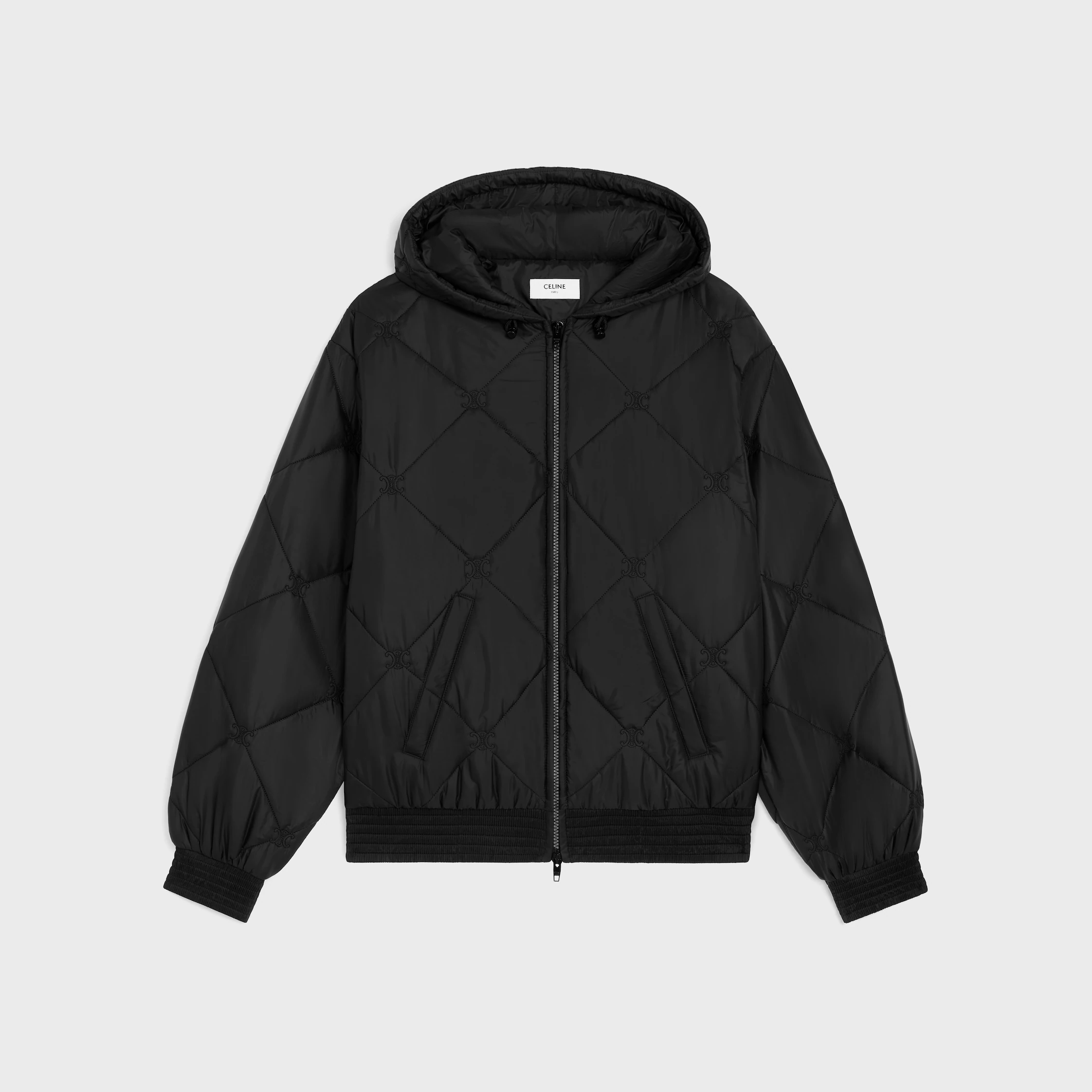 kuddad jacka IN i ljus nylon